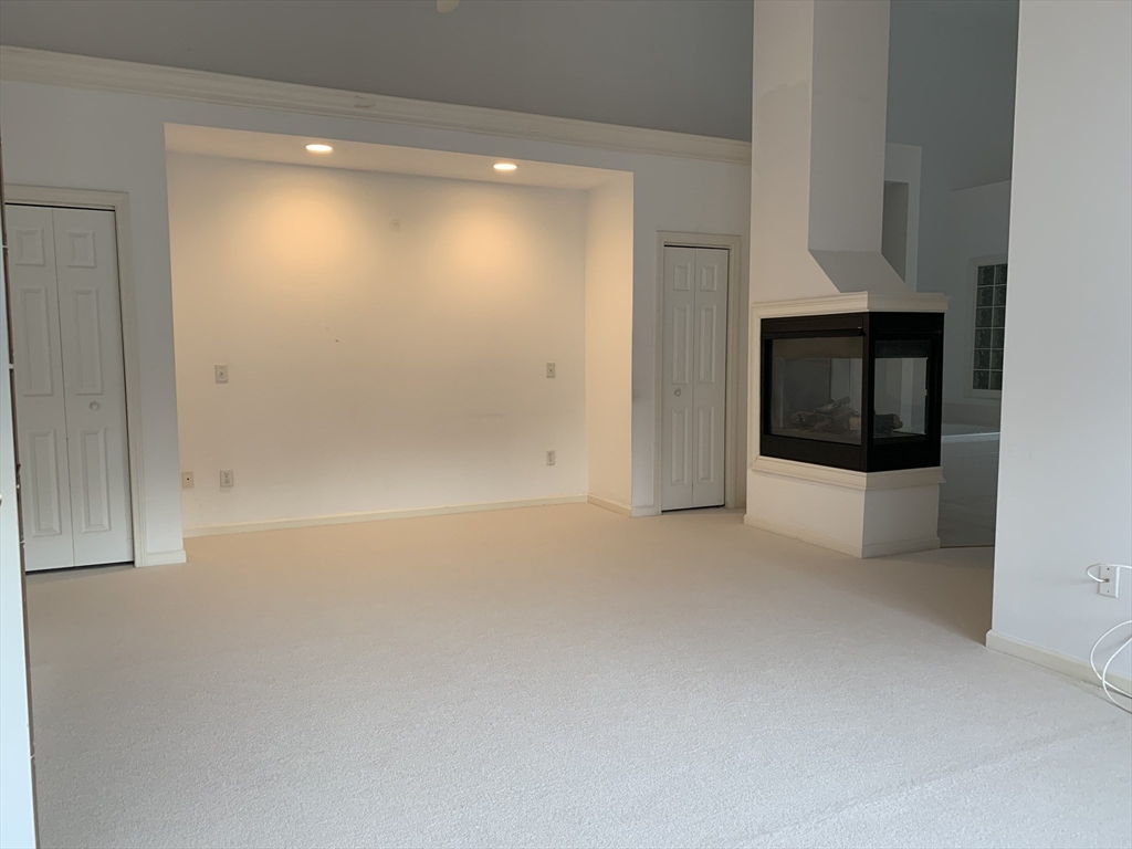 73 Half Crown Circle, Unit 73 Ashland, MA 01721 - Photo 10 of 18 a view of empty room