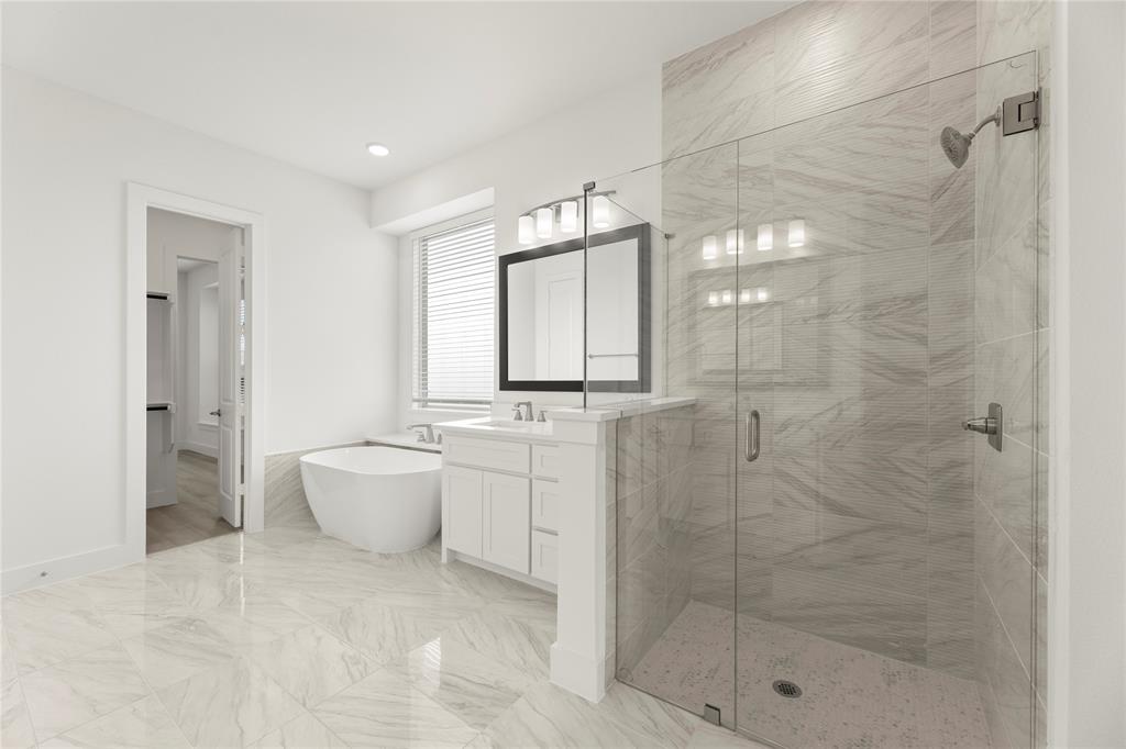 971 Georgetown Place Prosper, TX 75078 - Photo 24 of 34 a bathroom with a granite countertop sink a toilet and shower