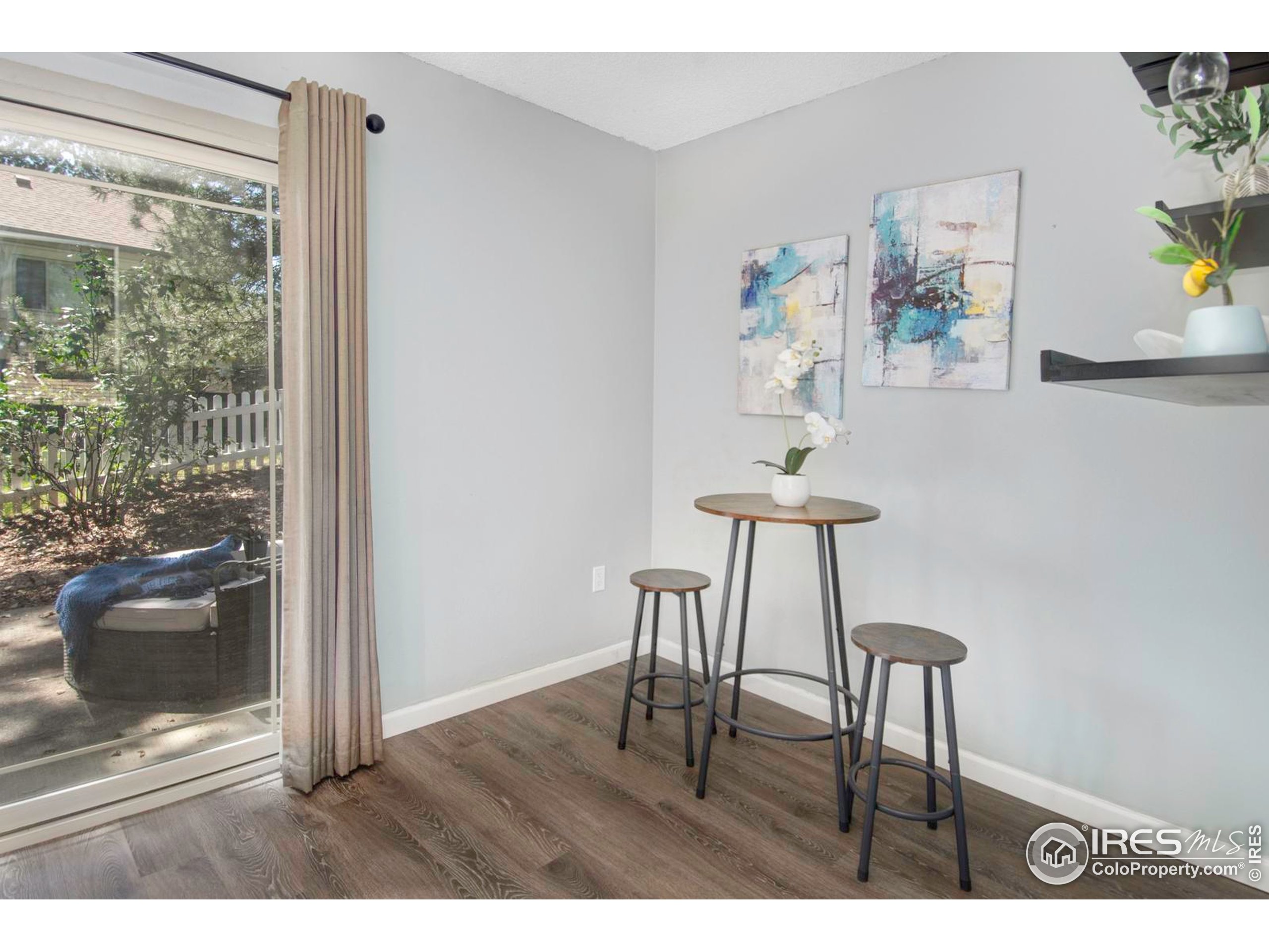 750 West Moorhead Circle, Unit A Boulder, CO 80305 - Photo 3 of 38 a view of a room with a table and chairs