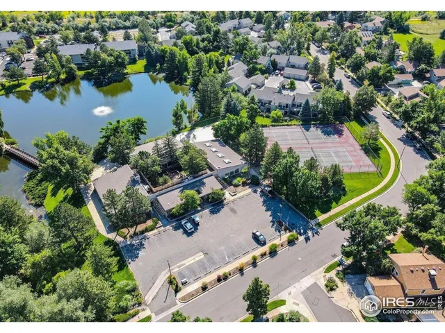 an aerial view of lake residential houses with outdoor space and lake view