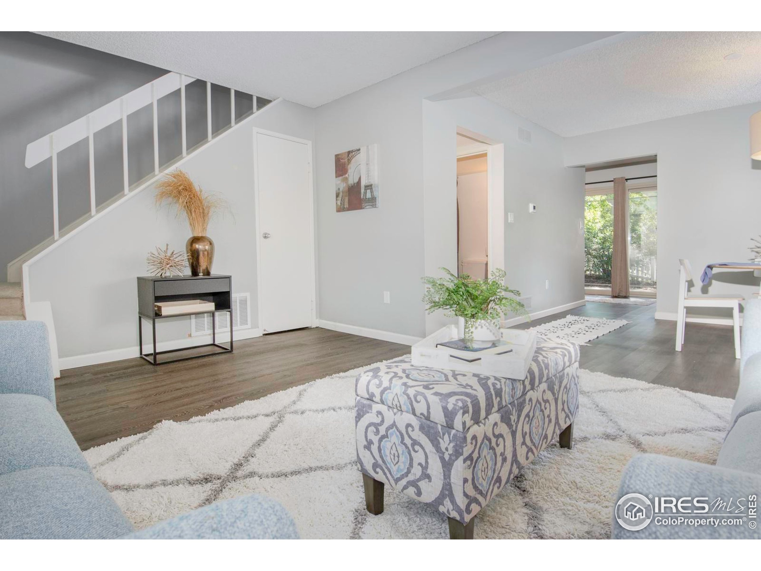 750 West Moorhead Circle, Unit A Boulder, CO 80305 - Photo 7 of 38 a view of living room filled with furniture and a potted plant