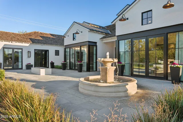 a view of a house with porch and furniture