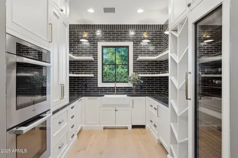 a bathroom with a bathtub and a sink