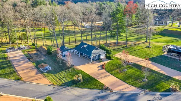 a view of a chairs with a table in balcony