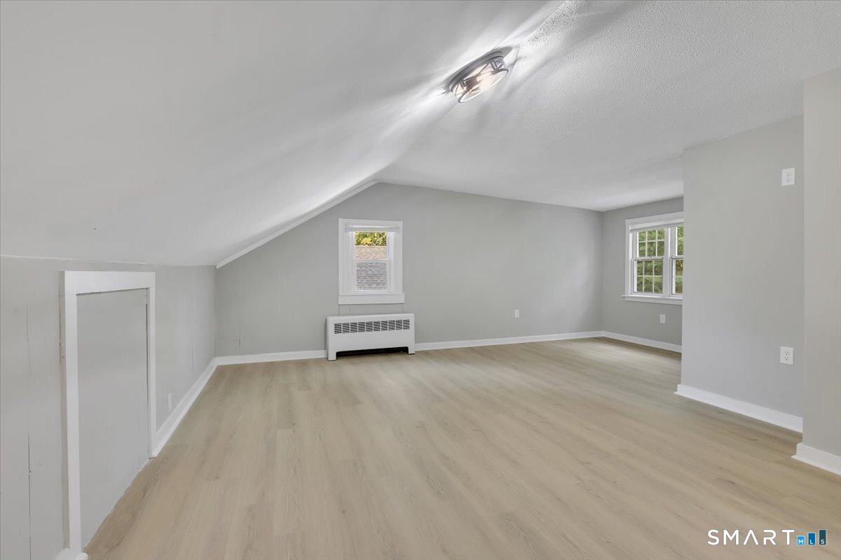 16 Strong Street Burlington, CT 06013 - Photo 20 of 36 a view of an empty room with a window