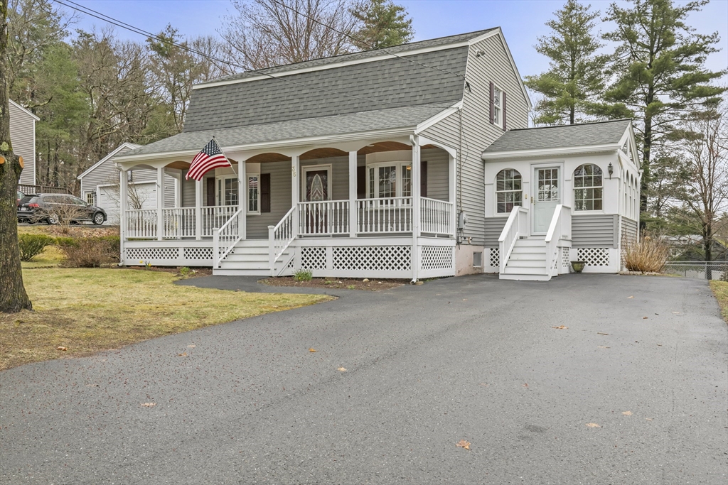 36 Emery Road Townsend, MA 01469 - Photo 1 of 40 a front view of a house with a yard
