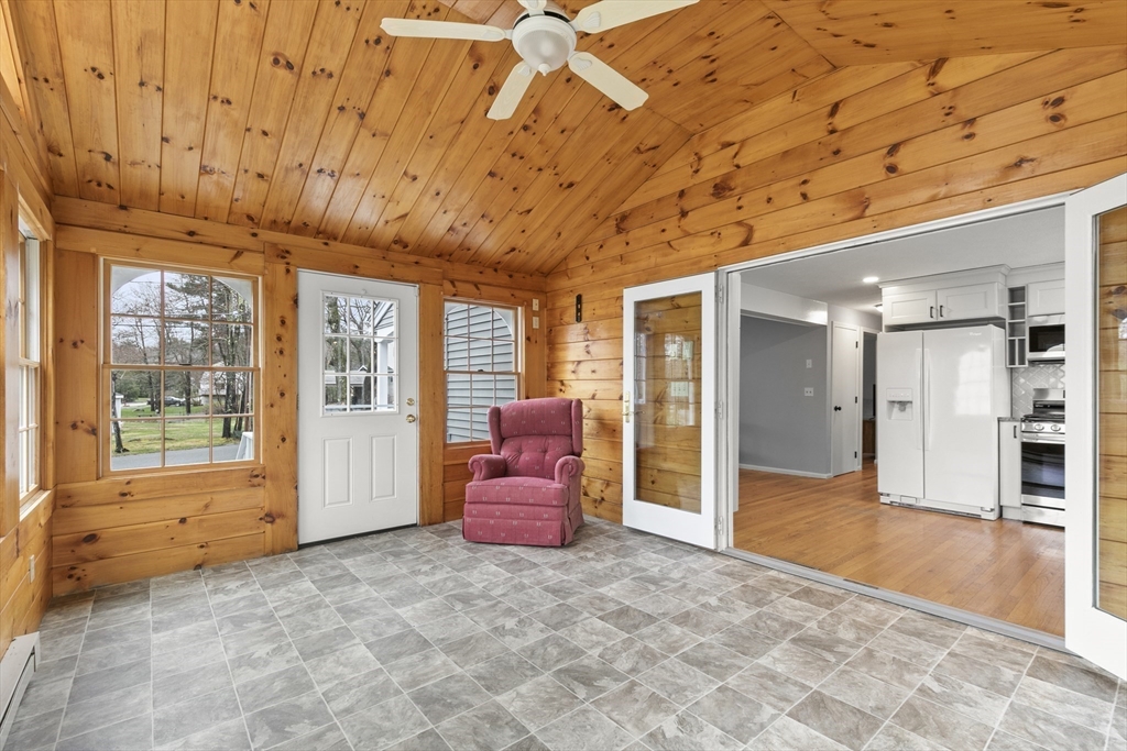 36 Emery Road Townsend, MA 01469 - Photo 12 of 40 a view of a livingroom with wooden floor and a couch