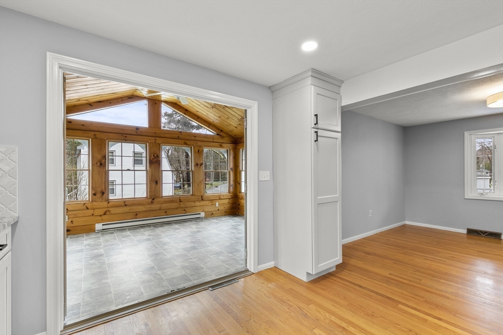 36 Emery Road Townsend, MA 01469 - Photo 16 of 40 wooden floor in a room with a large window