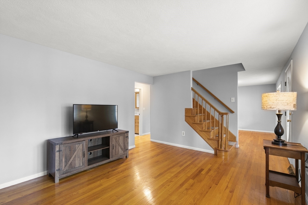 36 Emery Road Townsend, MA 01469 - Photo 24 of 40 a living room with furniture and a flat screen tv