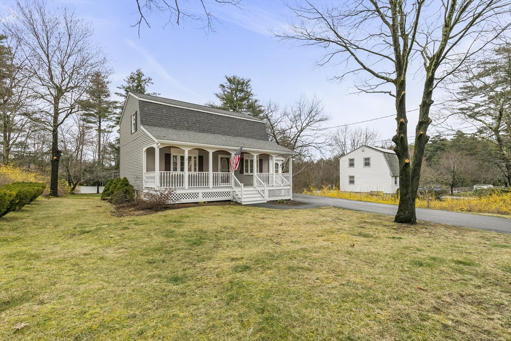 36 Emery Road Townsend, MA 01469 - Photo 3 of 40 a view of a house with a swimming pool