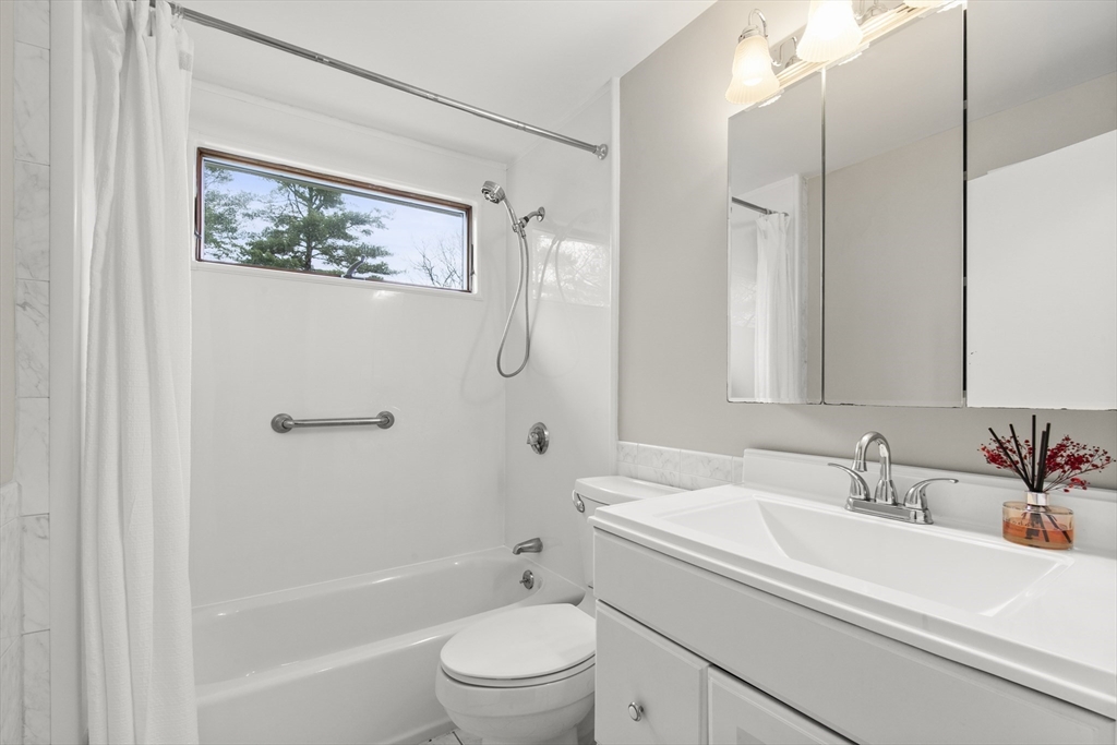 36 Emery Road Townsend, MA 01469 - Photo 31 of 40 a bathroom with a sink a toilet and shower