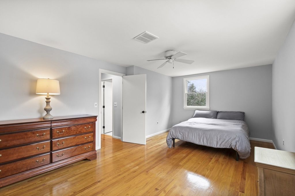 36 Emery Road Townsend, MA 01469 - Photo 33 of 40 a bedroom with a bed and a dresser