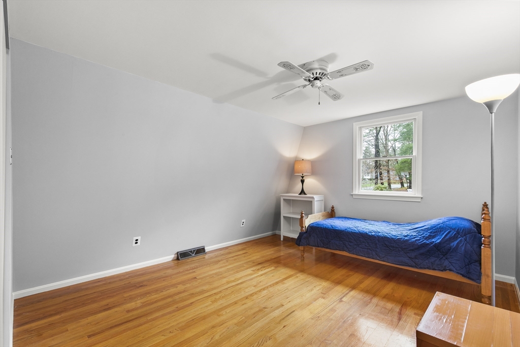 36 Emery Road Townsend, MA 01469 - Photo 36 of 40 a bedroom with a bed and window