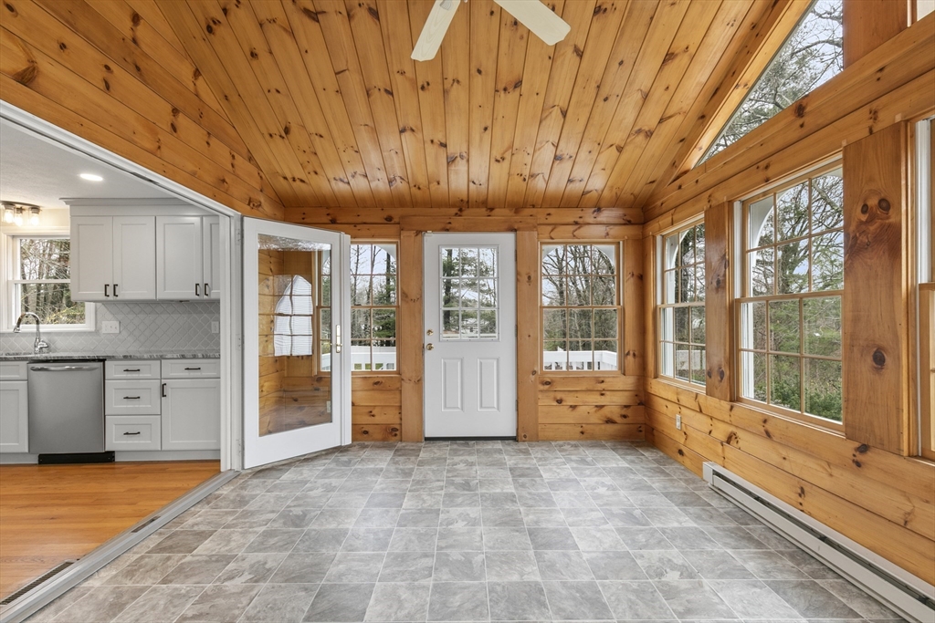 36 Emery Road Townsend, MA 01469 - Photo 10 of 40 a large room with a large window and stainless steel appliances