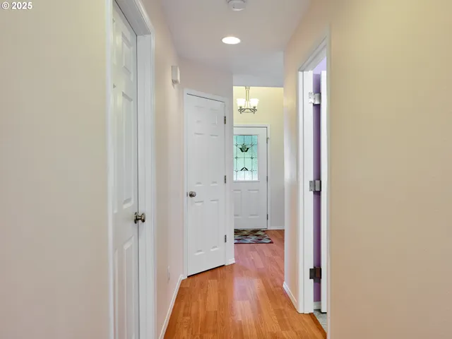 a bathroom with a sink and a glass door