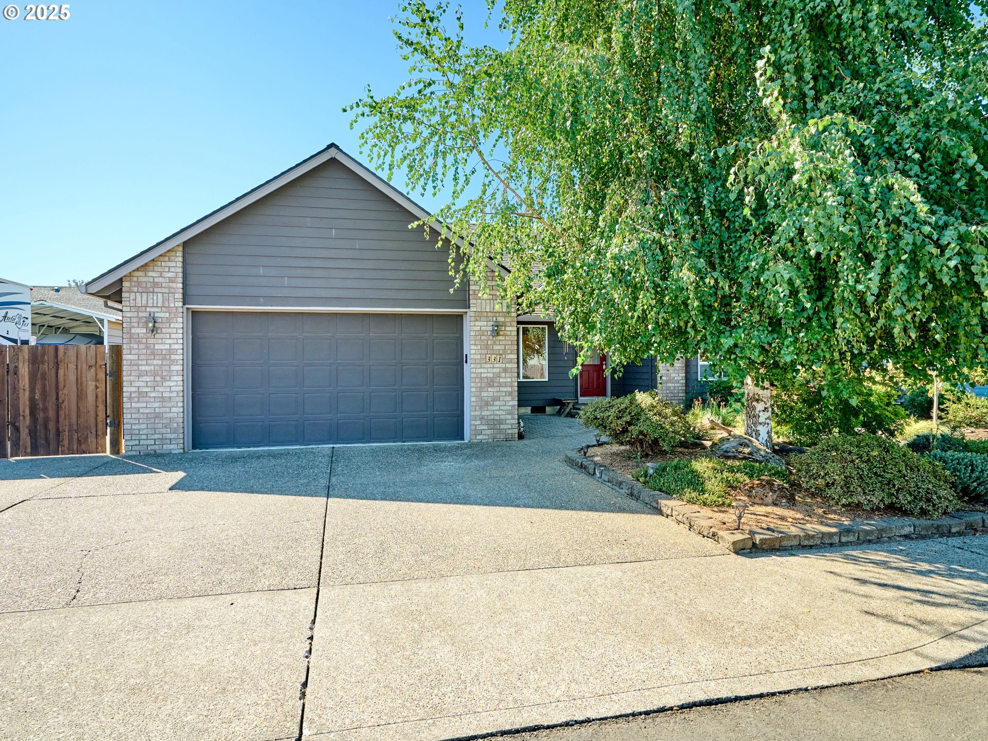 331 Southeast 9th Avenue Canby, OR 97013 - Photo 2 of 35 a view of backyard of house
