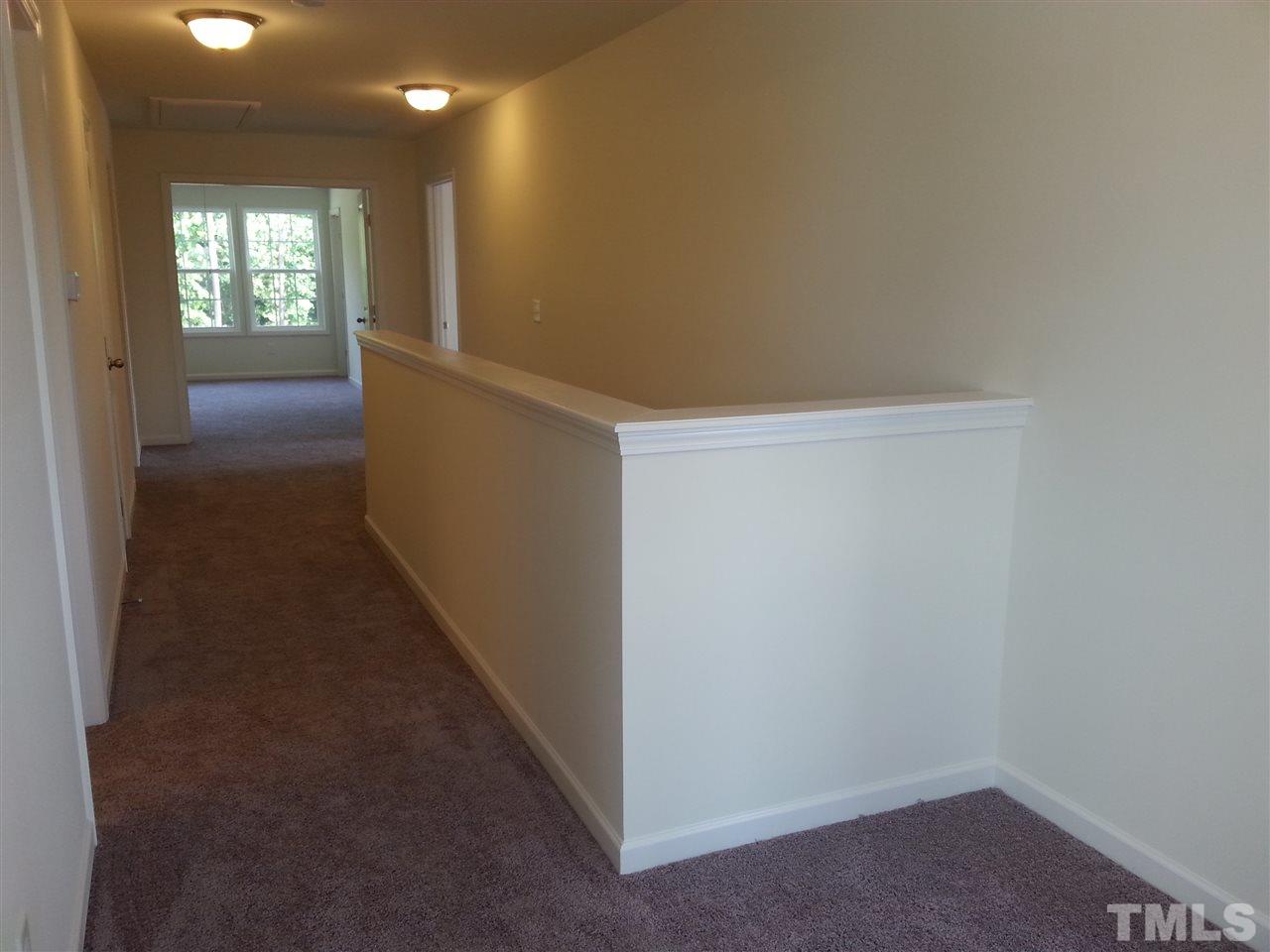 7516 Channery Way Raleigh, NC 27616 - Photo 17 of 25 a view of hallway with window