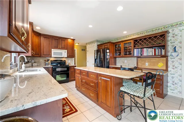 a living room with furniture window and wooden floor