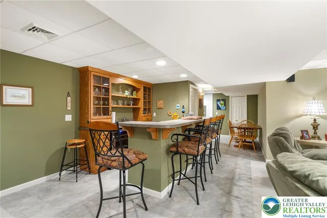 a dining room with furniture and a table