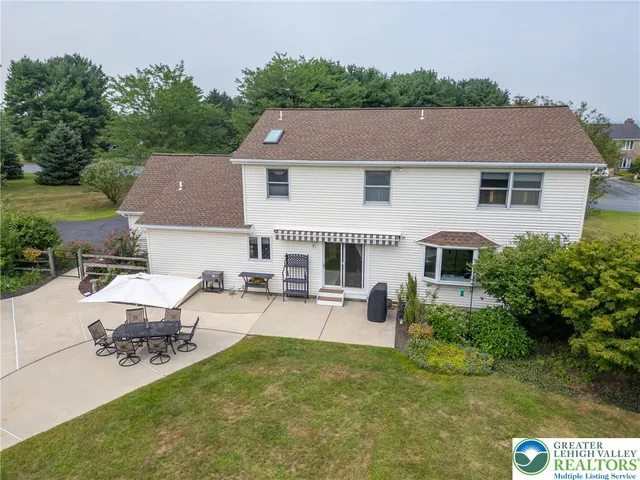 a aerial view of a house with garden