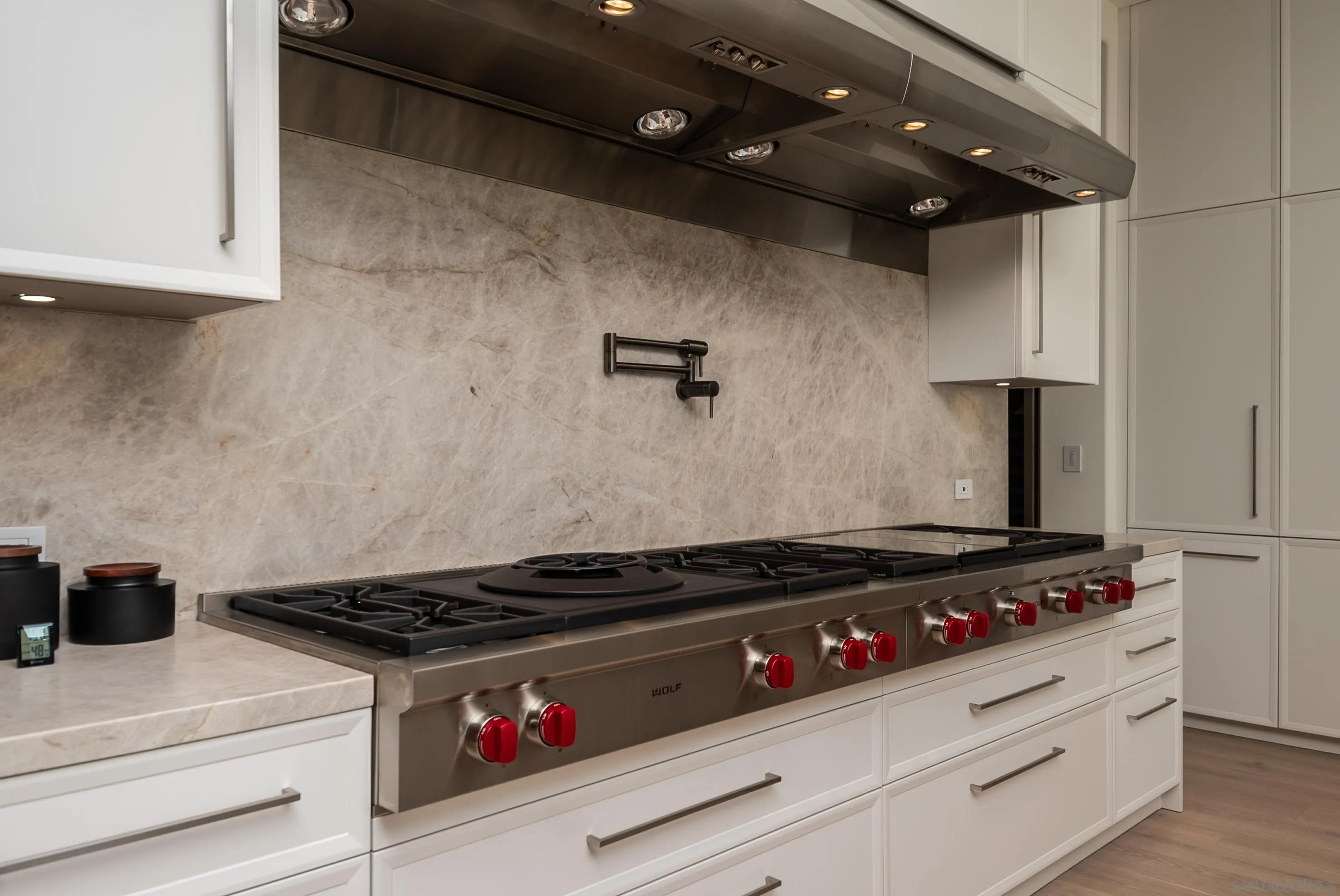 18650 Old Coach Way Poway, CA 92064 - Photo 12 of 63 a stove top oven sitting inside of a kitchen