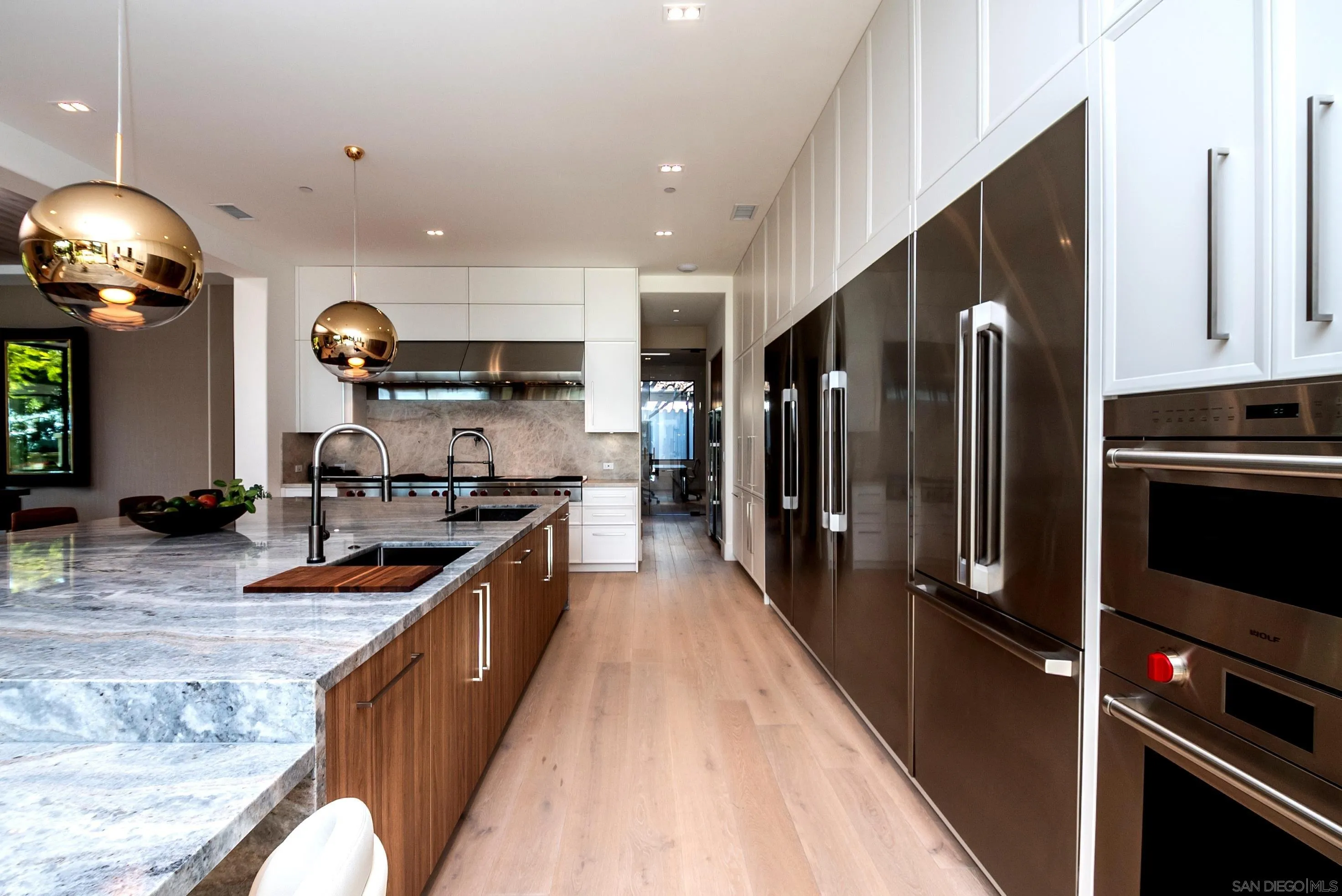 18650 Old Coach Way Poway, CA 92064 - Photo 16 of 63 a kitchen with stainless steel appliances granite countertop a refrigerator a stove and a sink
