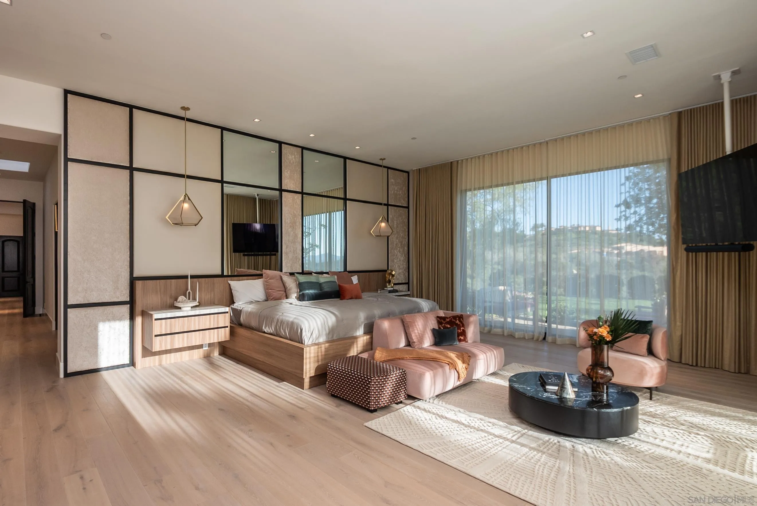 18650 Old Coach Way Poway, CA 92064 - Photo 27 of 63 a spacious bedroom with a bed and a large window