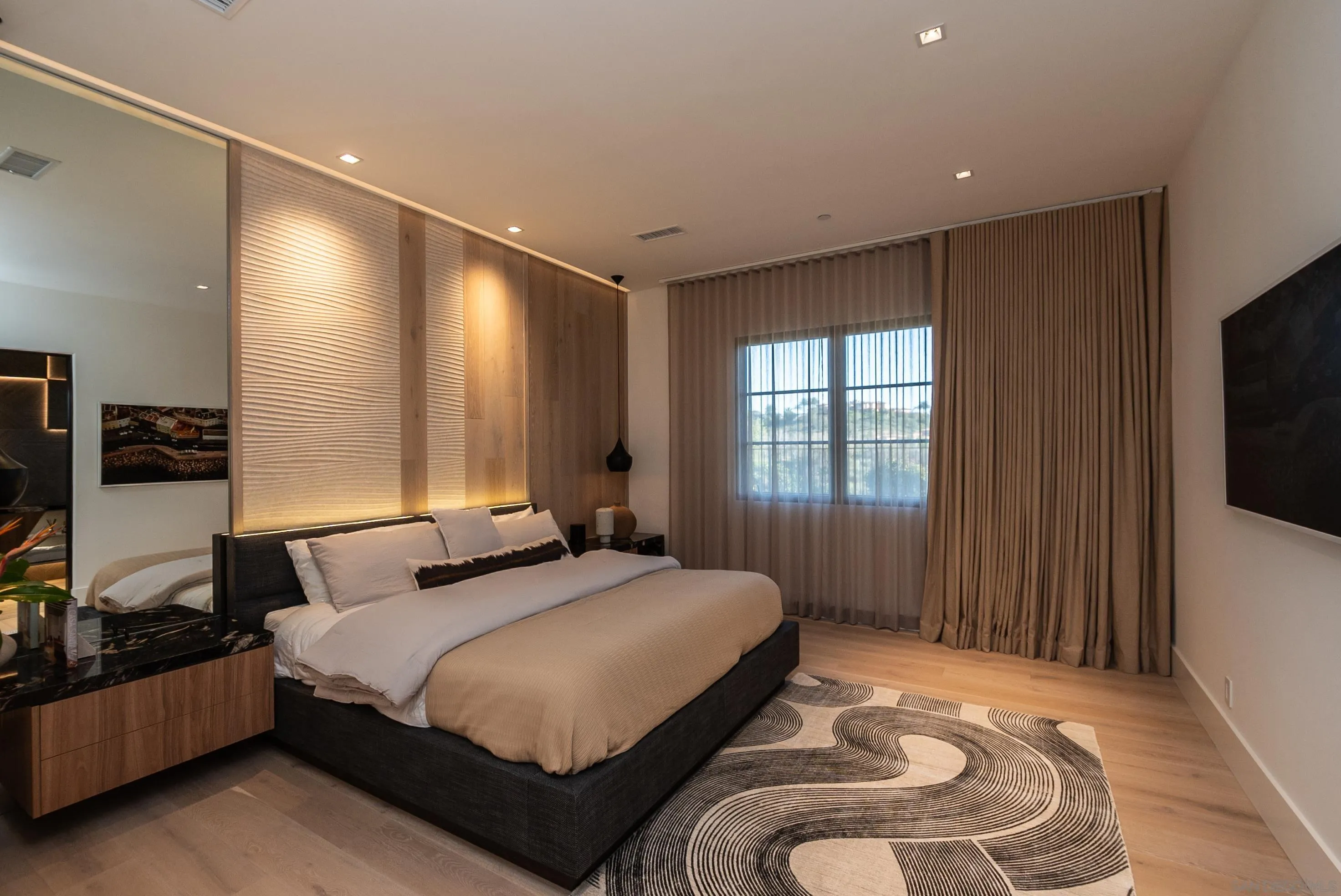 18650 Old Coach Way Poway, CA 92064 - Photo 38 of 63 a bedroom with a bed and a flat tv screen on the dresser