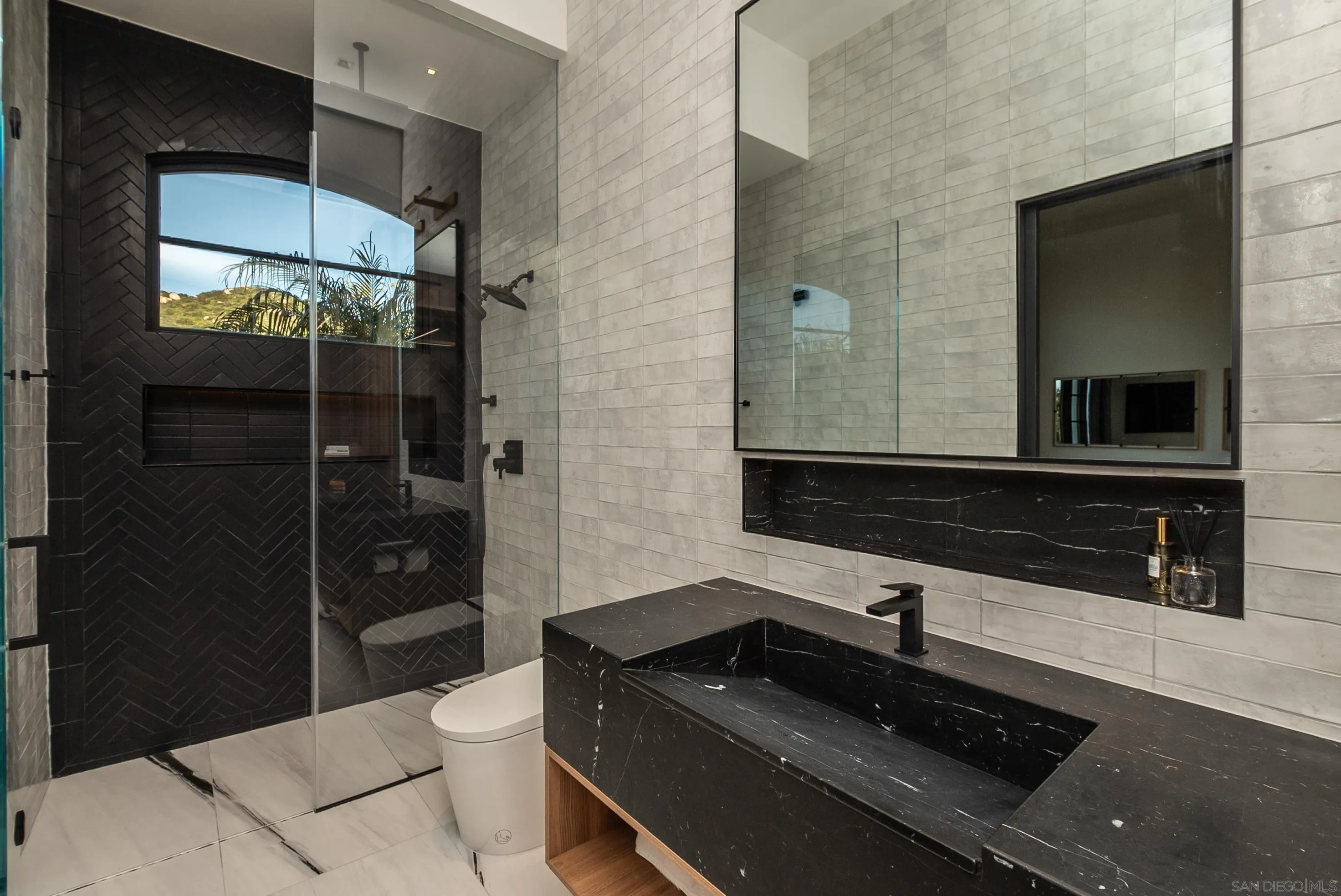 18650 Old Coach Way Poway, CA 92064 - Photo 45 of 63 a bathroom with a sink and a mirror