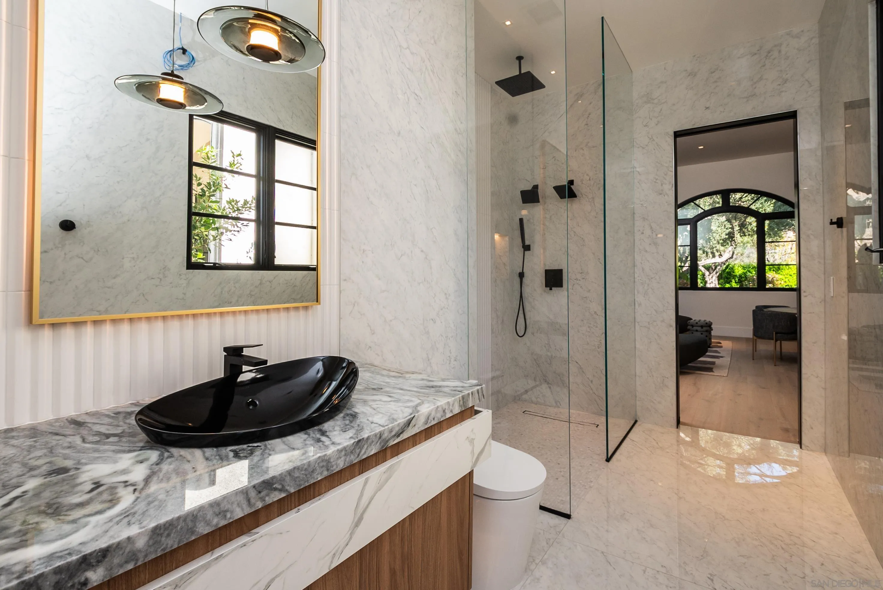 18650 Old Coach Way Poway, CA 92064 - Photo 48 of 63 a bathroom with a sink a toilet and shower