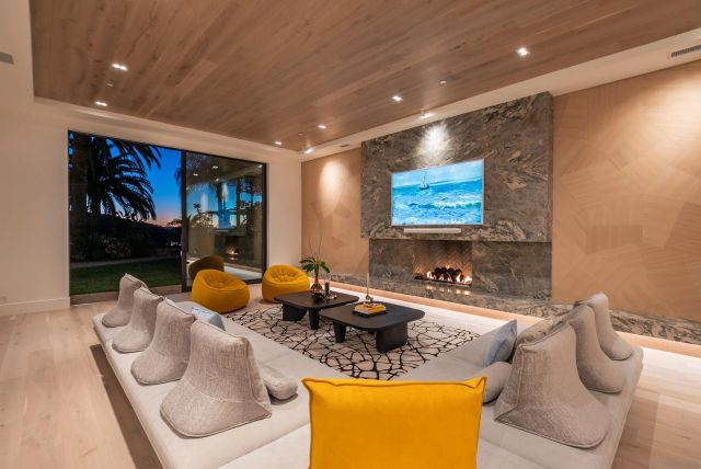 a room with furniture and a potted plant