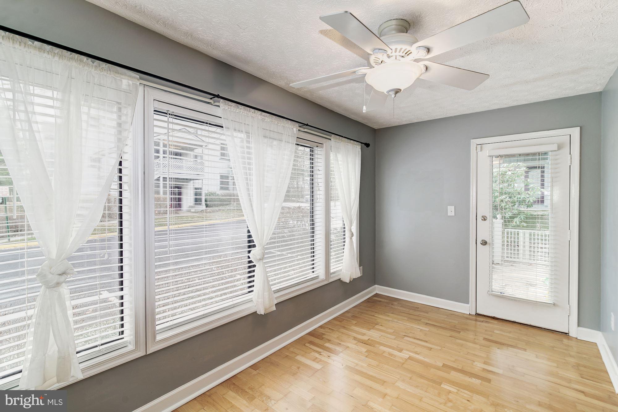 2224 Hunter's Run Drive, Unit 2224 Reston, VA 20191 - Photo 8 of 21 a view of an empty room with a window