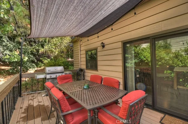 a outdoor dining space with furniture