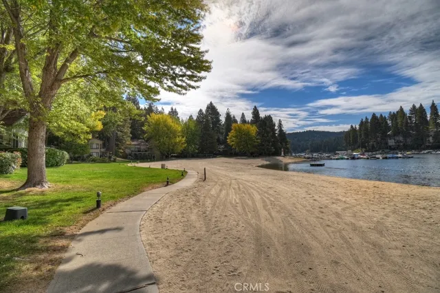 a view of swimming pool with a yard