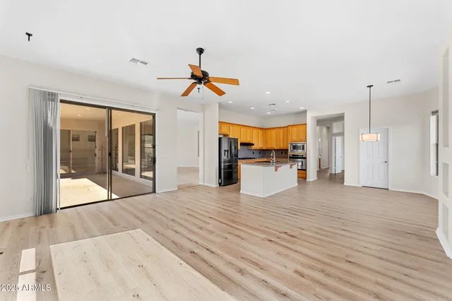 a view of a hallway with a chandelier