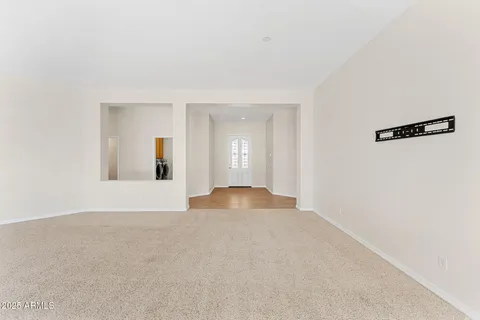 a bathroom with a sink a vanity and a mirror