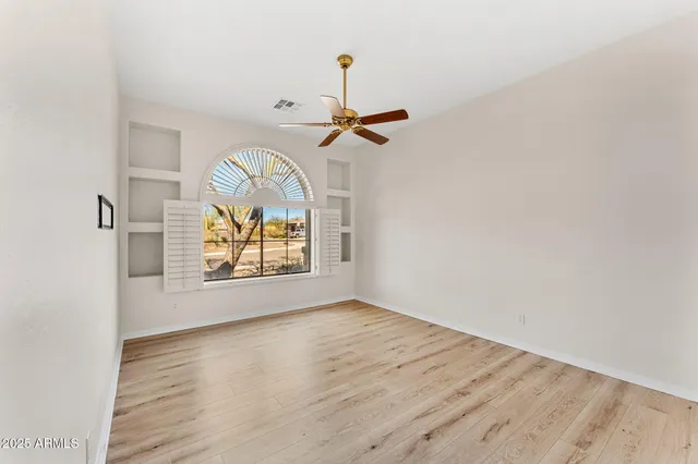 a view of an empty room with window