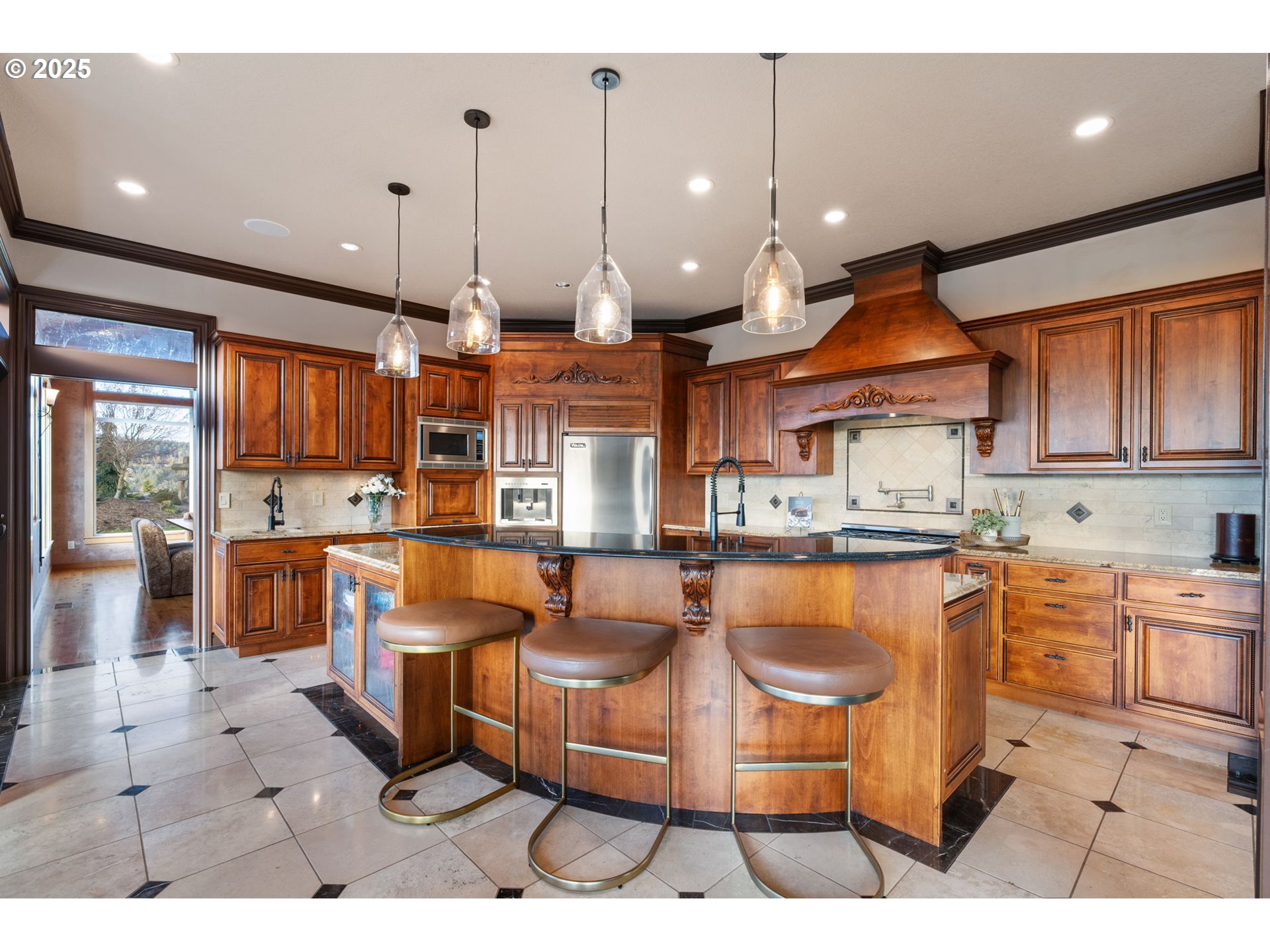 33302 Northwest 47th Court Ridgefield, WA 98642 - Photo 12 of 48 a dining table chairs and a open kitchen view