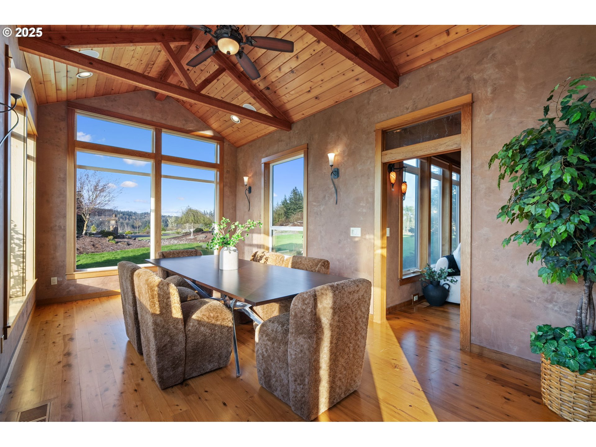 33302 Northwest 47th Court Ridgefield, WA 98642 - Photo 16 of 48 a dining room with furniture and wooden floor