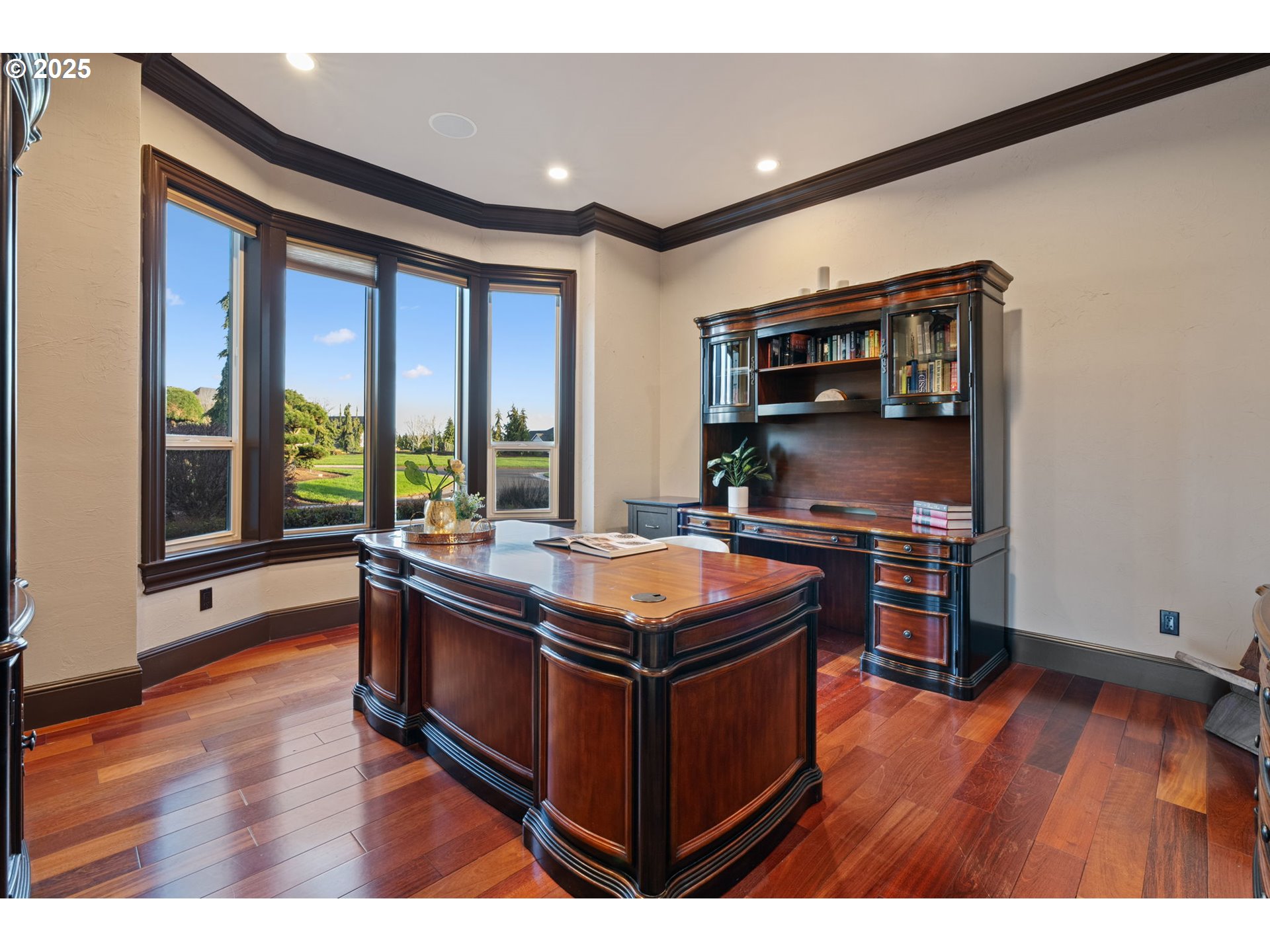 33302 Northwest 47th Court Ridgefield, WA 98642 - Photo 18 of 48 a living room with stainless steel appliances kitchen island granite countertop a stove a refrigerator and a dining table with wooden floor