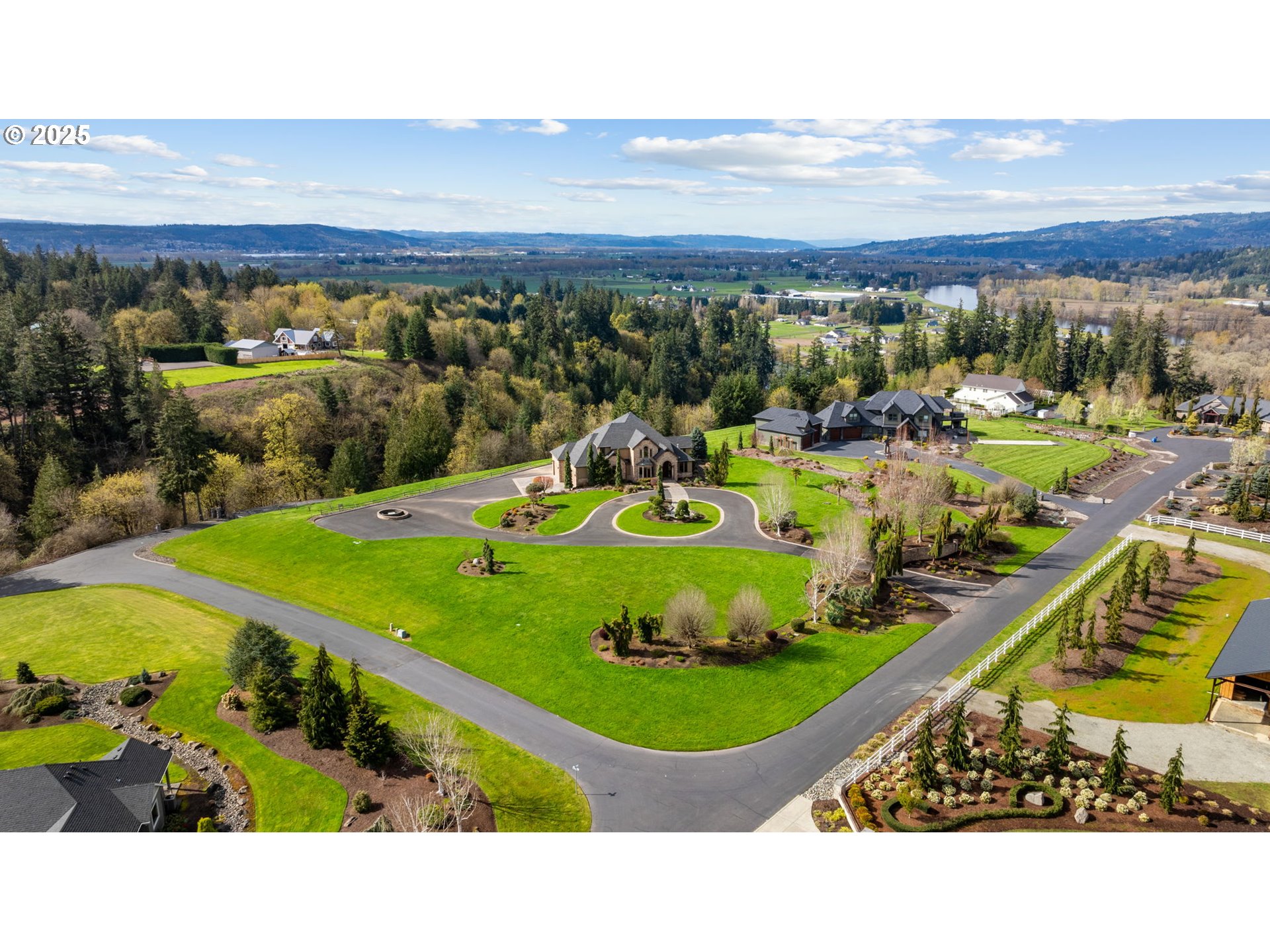 33302 Northwest 47th Court Ridgefield, WA 98642 - Photo 2 of 48 a view of a swimming pool with an outdoor seating