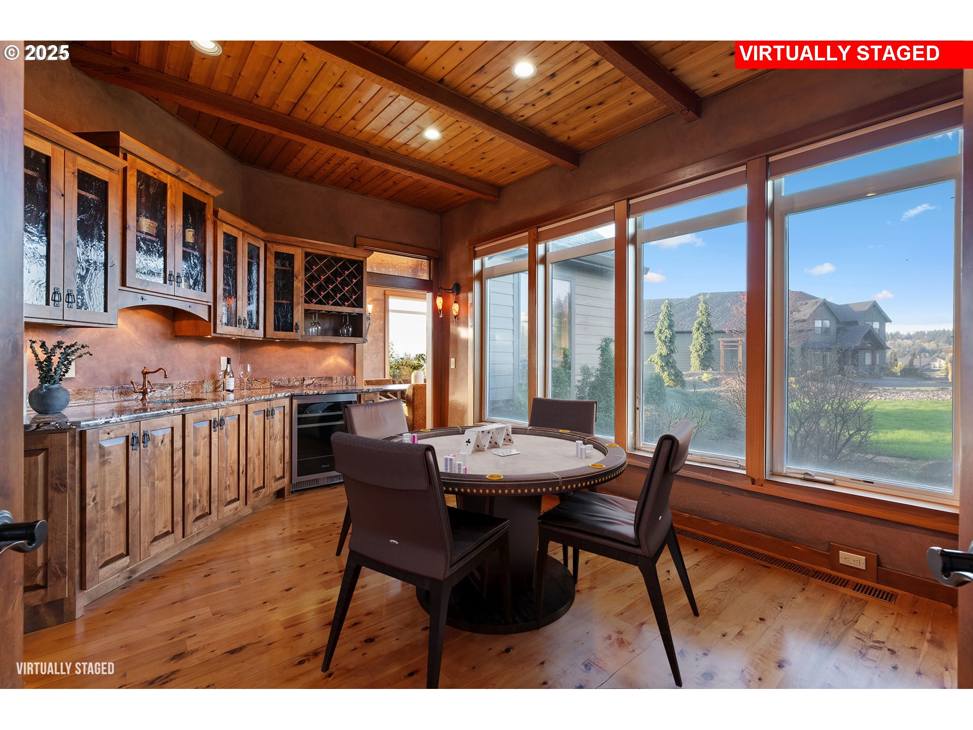 33302 Northwest 47th Court Ridgefield, WA 98642 - Photo 24 of 48 a dining room with furniture and a floor to ceiling window