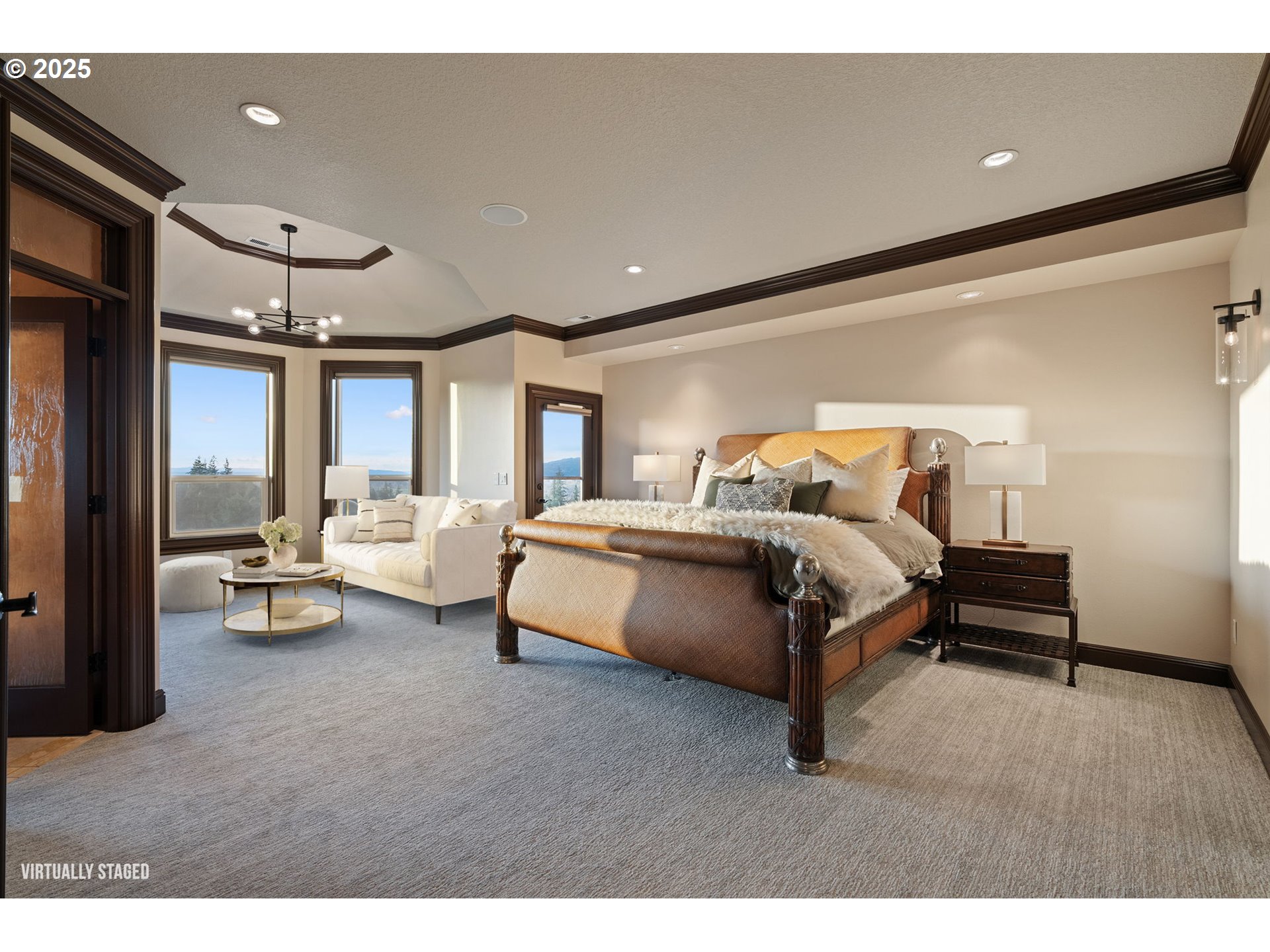 33302 Northwest 47th Court Ridgefield, WA 98642 - Photo 28 of 48 a spacious bedroom with a bed and a couch