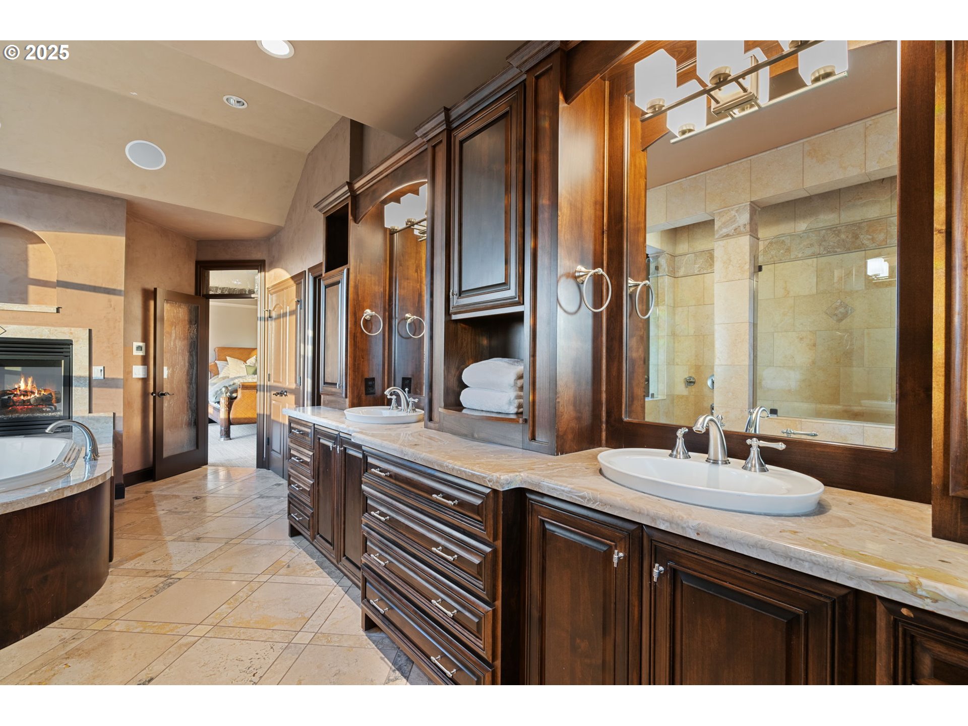 33302 Northwest 47th Court Ridgefield, WA 98642 - Photo 31 of 48 a bathroom with a sink double vanity granite tub shower and a mirror