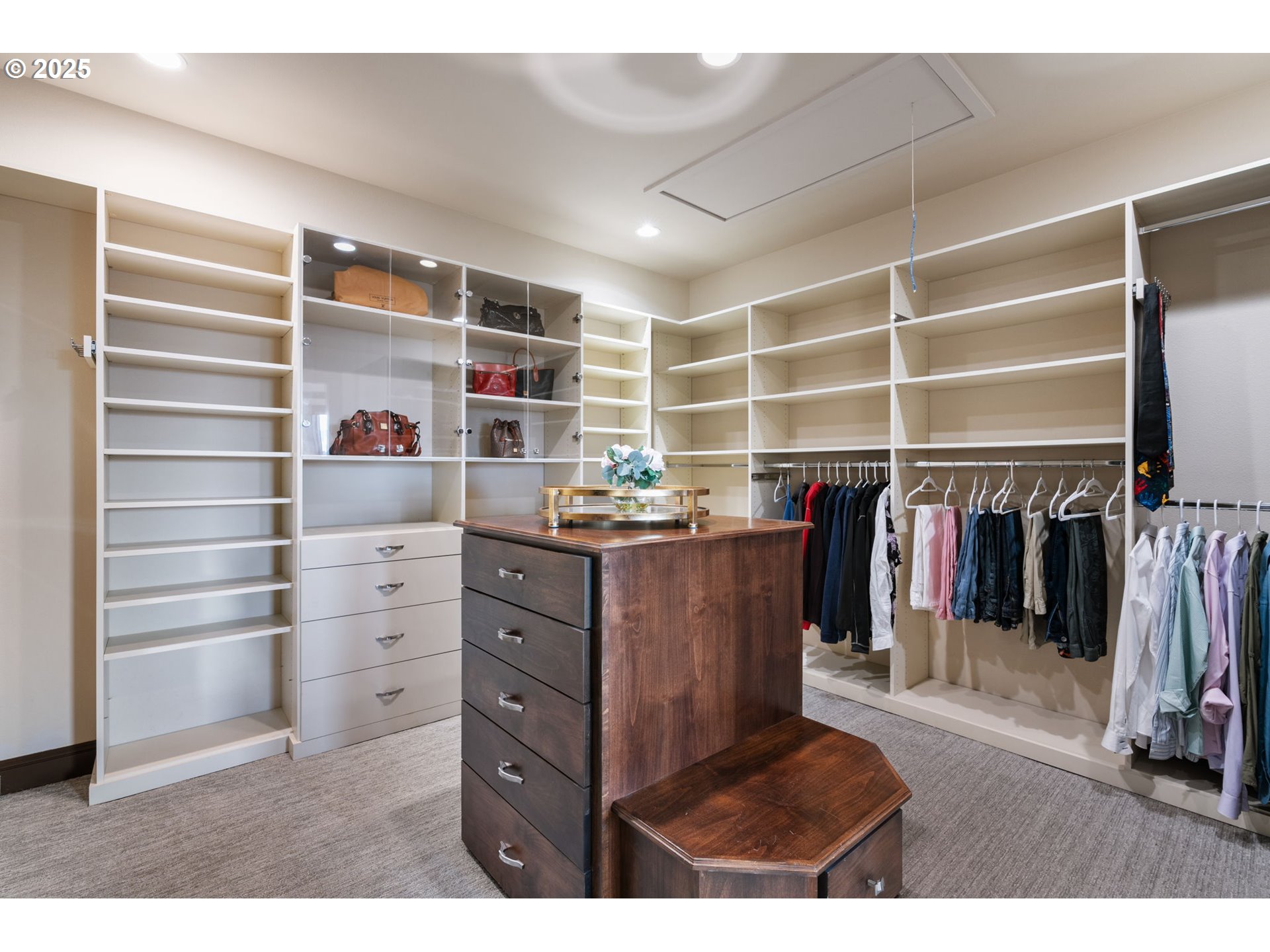 33302 Northwest 47th Court Ridgefield, WA 98642 - Photo 33 of 48 a view of walk in closet with clothes and shoes