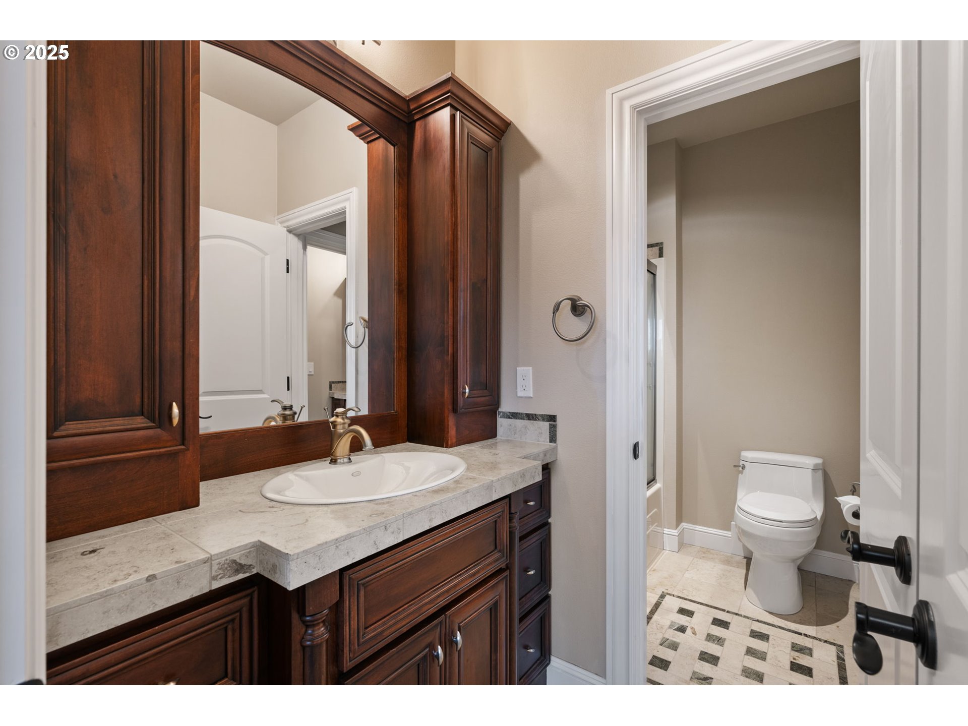 33302 Northwest 47th Court Ridgefield, WA 98642 - Photo 36 of 48 a bathroom with a granite countertop sink toilet and shower
