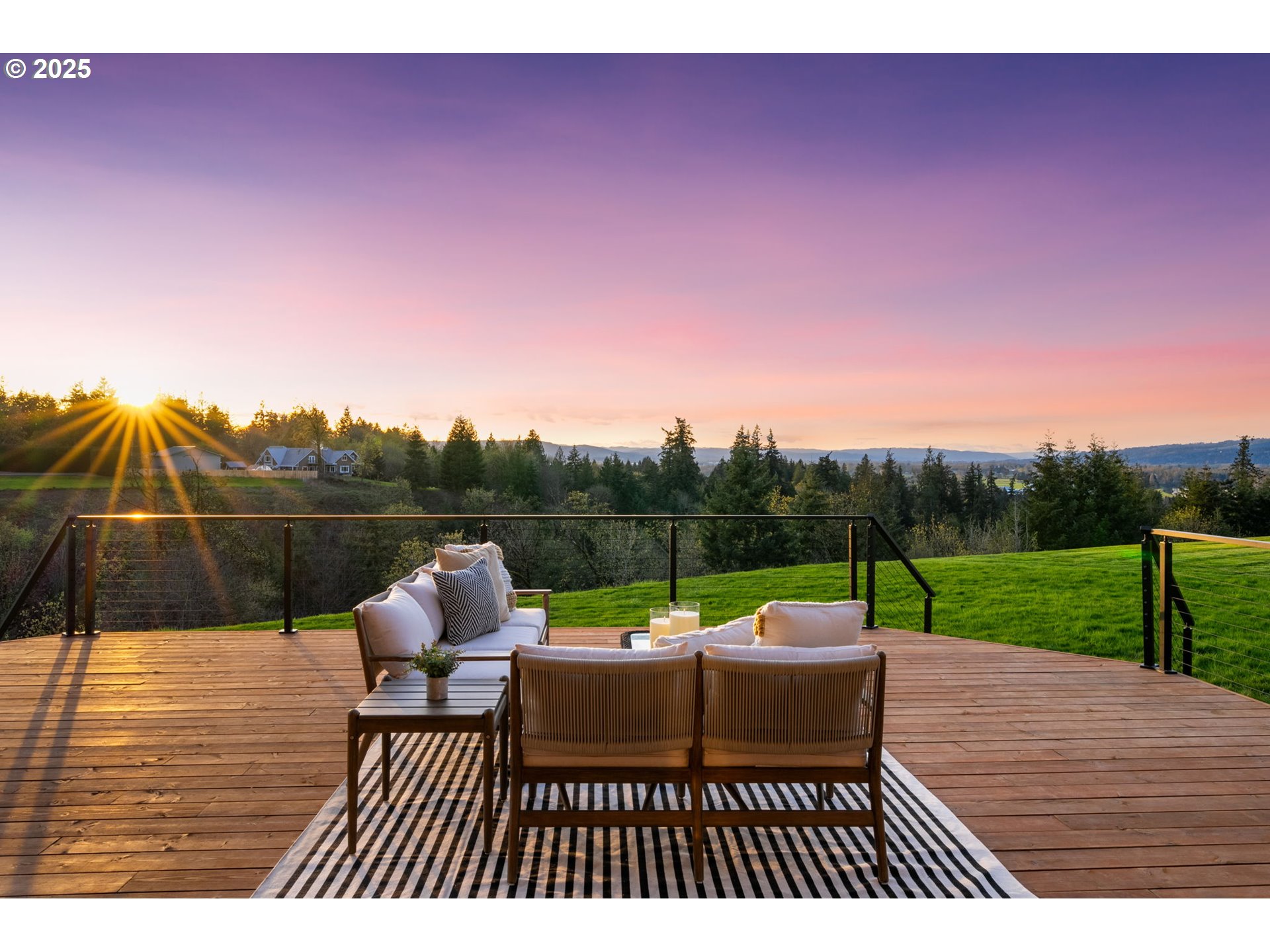 33302 Northwest 47th Court Ridgefield, WA 98642 - Photo 4 of 48 a view of a patio with table and chairs with wooden floor and fence