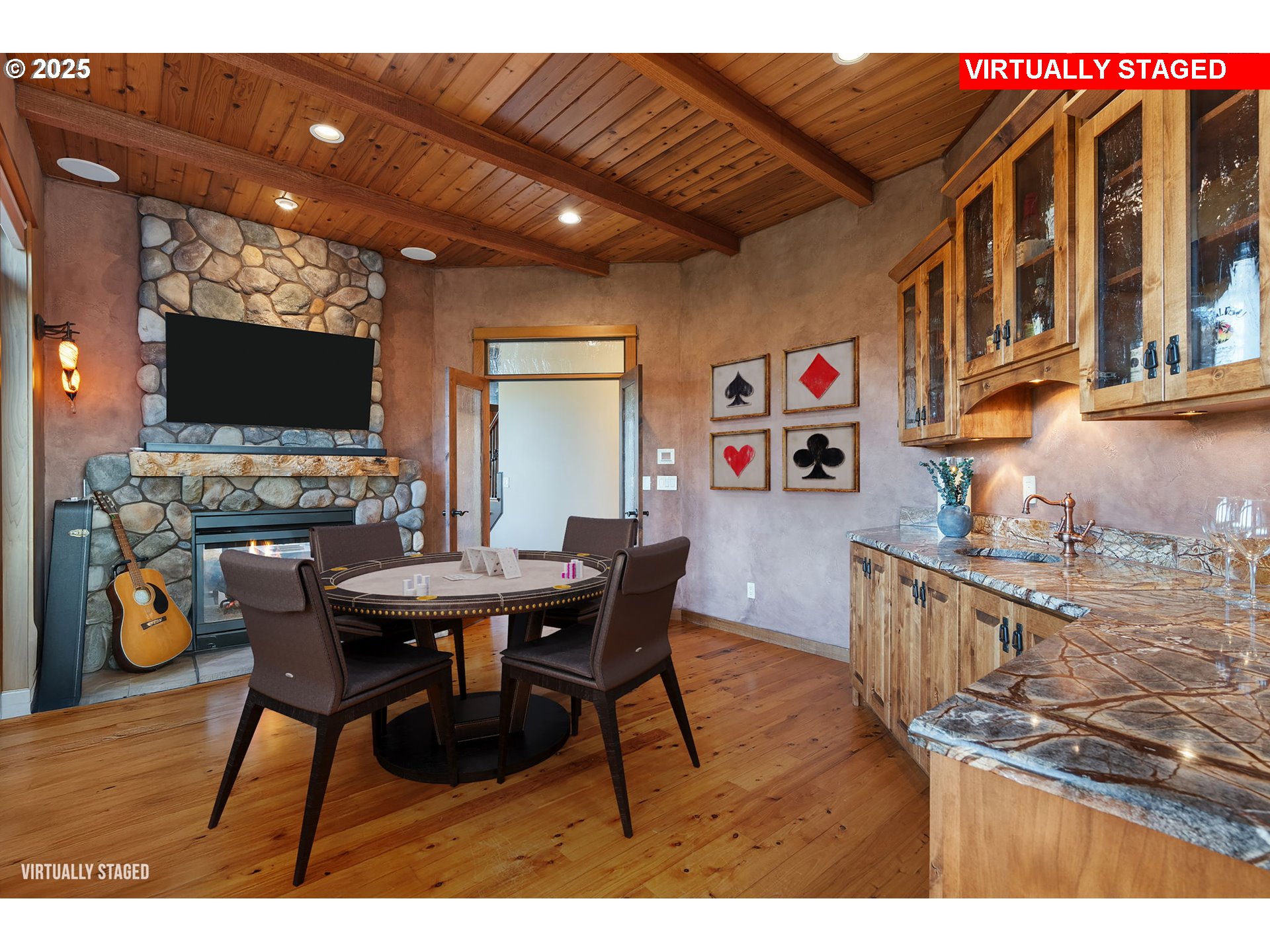 33302 Northwest 47th Court Ridgefield, WA 98642 - Photo 47 of 48 a dining room with furniture and a flat screen tv
