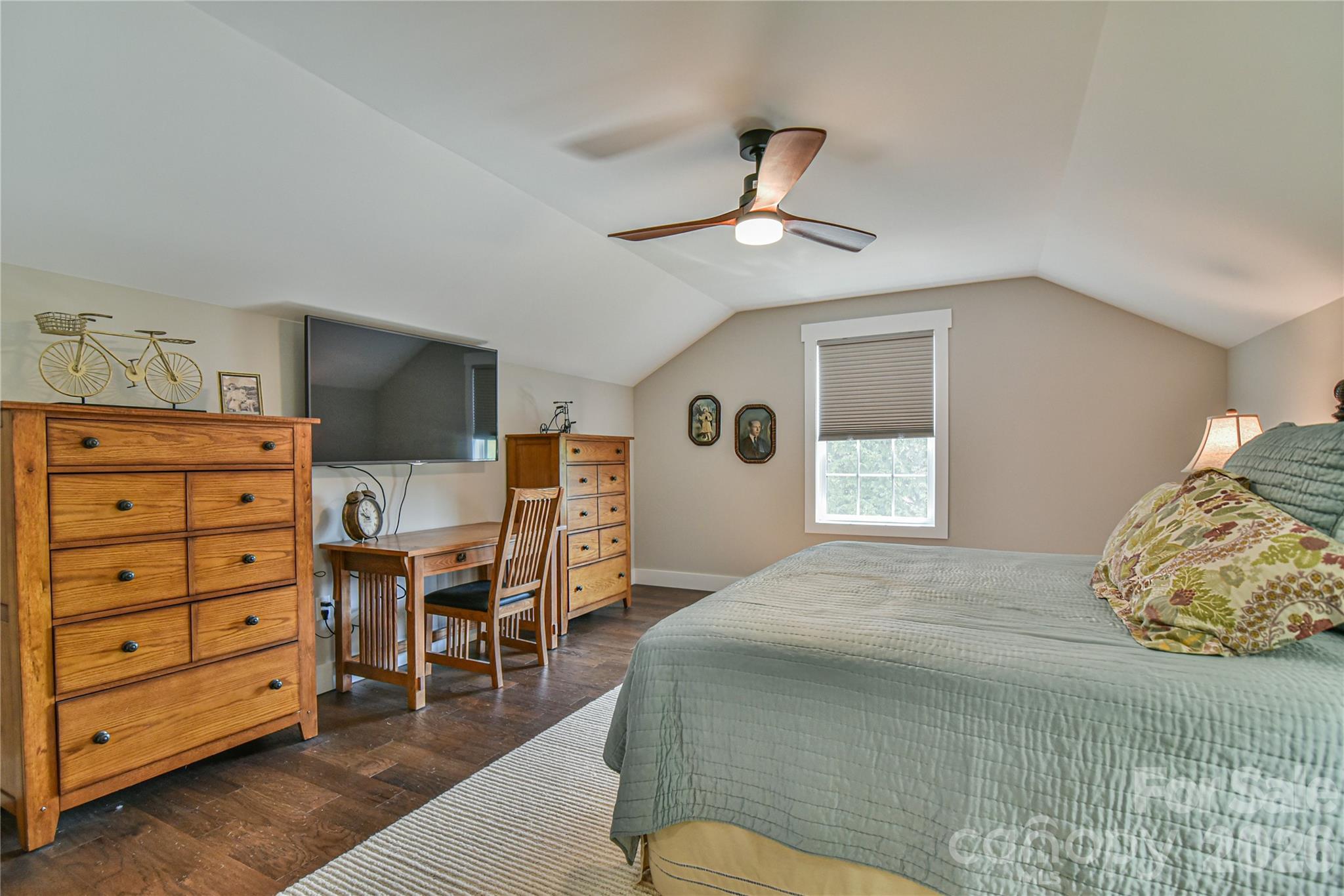 310 Portmanvilla Road Black Mountain, NC 28711 - Photo 23 of 30 a bedroom with a bed and furniture