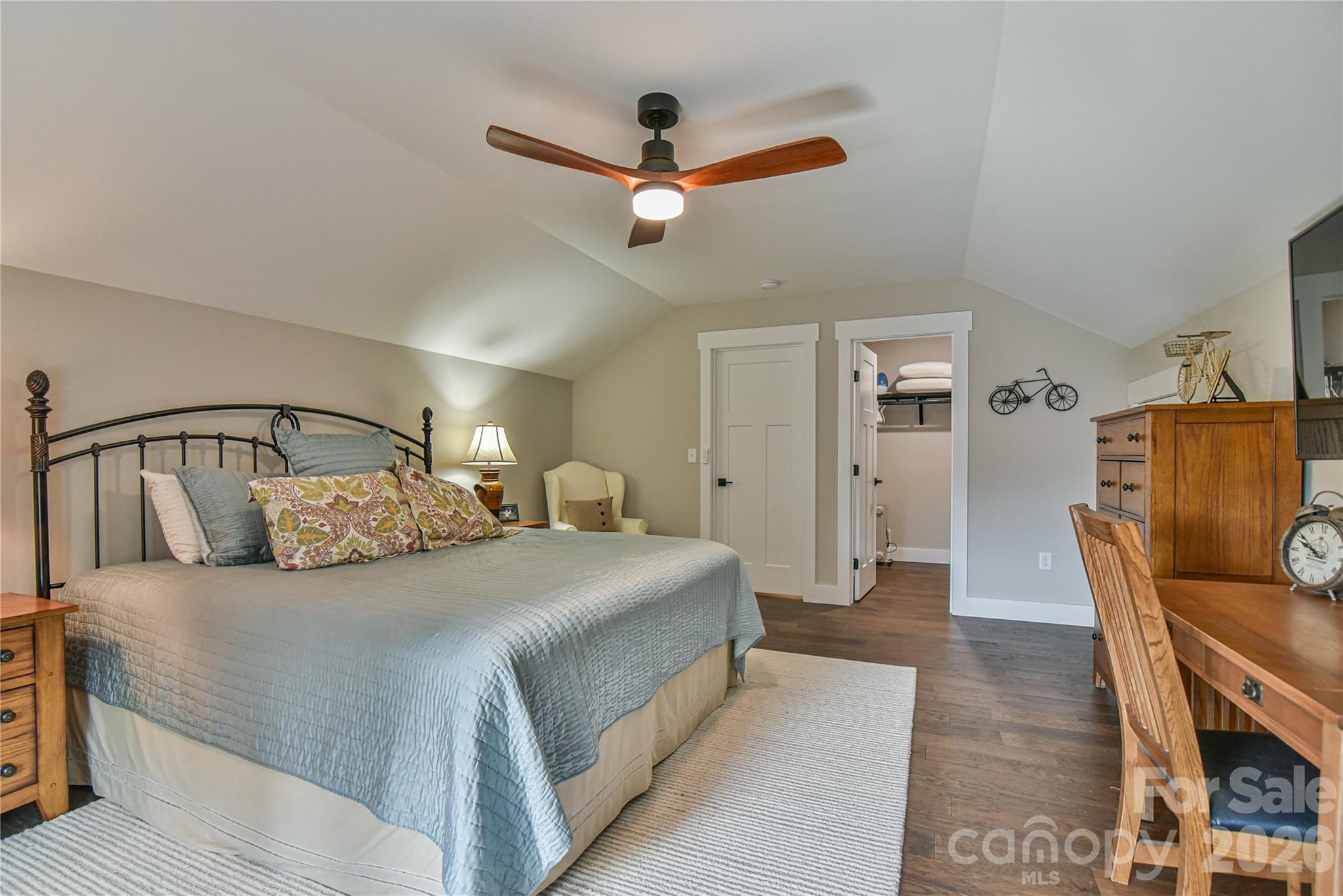 310 Portmanvilla Road Black Mountain, NC 28711 - Photo 24 of 30 a bedroom with a bed and wooden floor